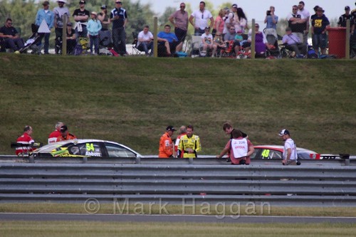 Hunter Abbot and Ollie Jackson after their crash in the second Touring Car race during the BTCC 2016 Weekend at Snetterton