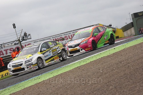 Hunter Abbott and Michael Epps in race two during the BTCC weekend at Knockhill, August 2016