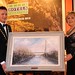 Gala Dinner IHF President Stephen McNally presents a painting of the Mary McAleese Bridge to former Irish President Professor Mary McAleese