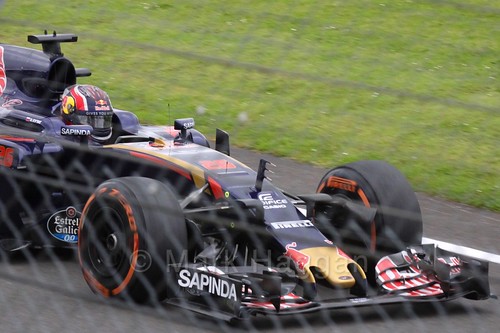 Daniil Kvyat drives down the pit lane entrance in his Toro Rosso in Free Practice 1 at the 2016 British Grand Prix at Silverstone