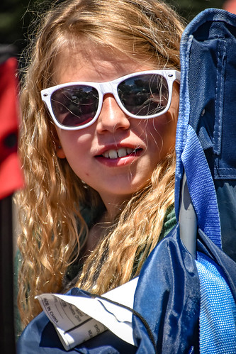 Nora with her new sunglasses at the parade. • <a style="font-size:0.8em;" href="http://www.flickr.com/photos/96277117@N00/27668113753/" target="_blank">View on Flickr</a>