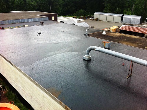 Stop-a-Drop Hot Rubberized Seamless Roof - no fine gravel as per Owners Request due to cleaning requirements