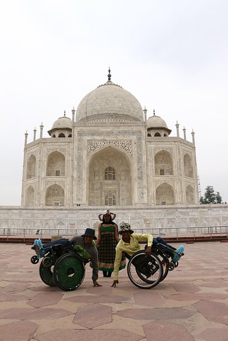 Accessible Tour of Taj Mahal: Three of them posing in front of the beautiful view of Taj Mahal