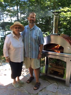 Ben and Ellen next to the new pizza oven • <a style="font-size:0.8em;" href="http://www.flickr.com/photos/96277117@N00/27756338404/" target="_blank">View on Flickr</a>