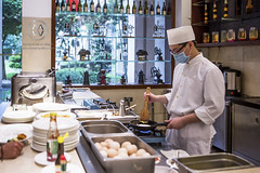 A hotel cook prepares breakfast in China.