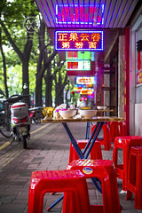 A neon adorned cafe along the streets of Guangzhou, China.